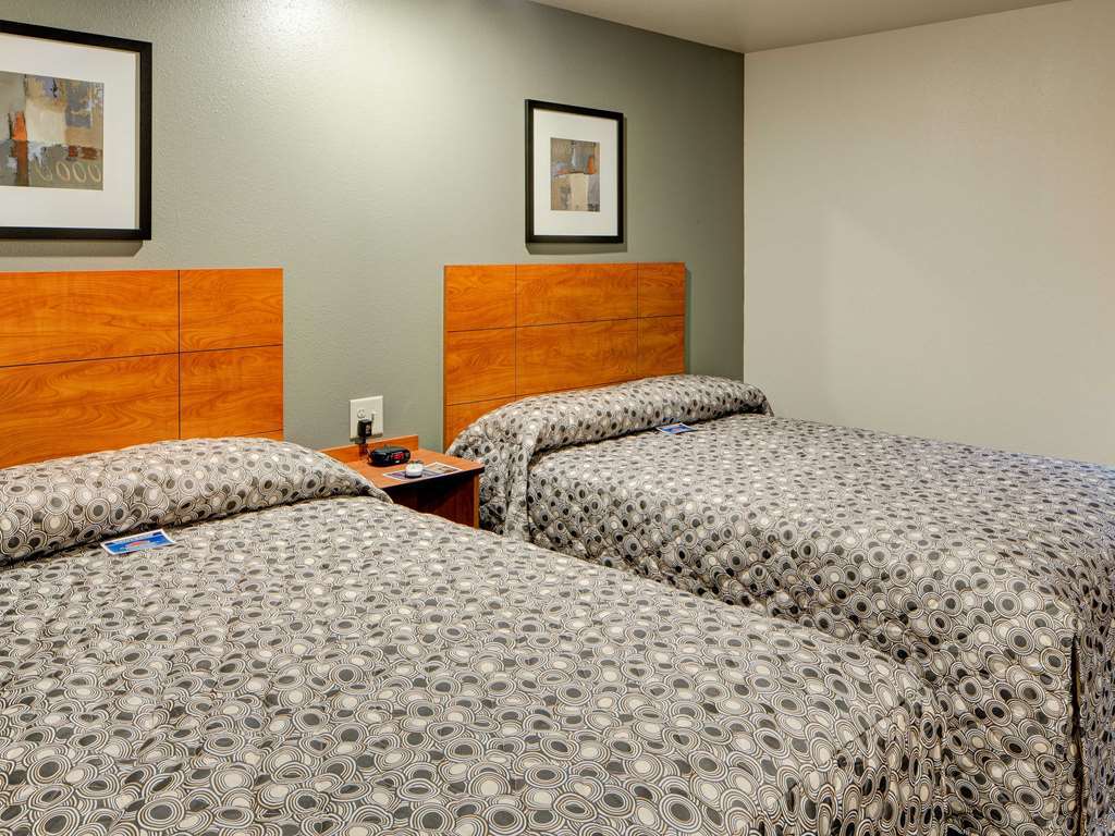Woodspring Suites Louisville Clarksville Номер фото
